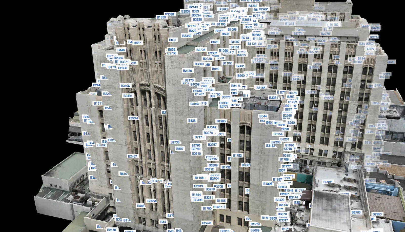 3D scan of a tall building covered with blue numbered labels