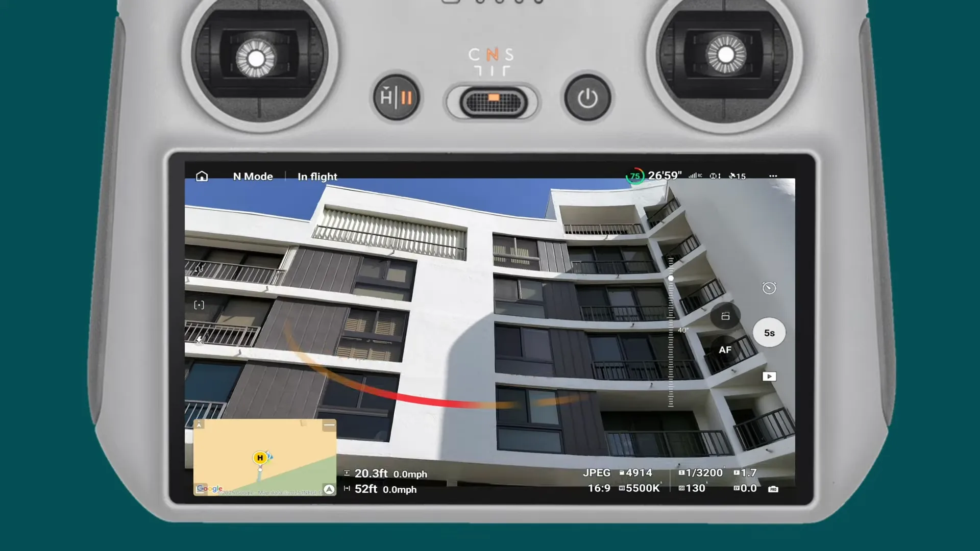 Drone controller view showing the building facade during capture